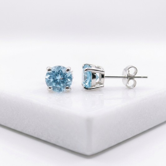 Clous d'oreilles en argent 925, avec topaze bleu ciel
