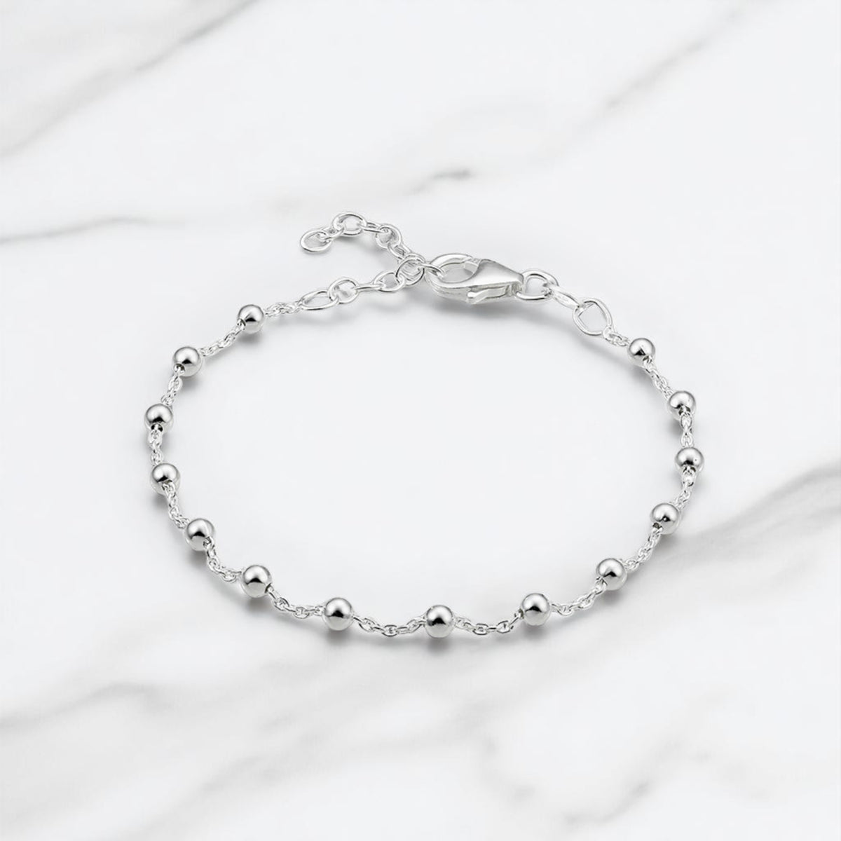 Bracelet en chaine perlée, en argent 925 passivé